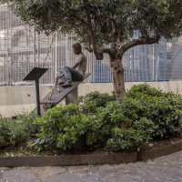 PIAZZA SANITA’ – September 6, 2015

The bronze statue installed in front of the Church of San Vincenzo, in the Sanità district in Naples, which depicts Genny Cesarano, killed by mistake at the age of 17 in Piazza Sanità (The statue was made by the master Paolo La Motta who met the seventeen years old throughout an artistic workshop) during a shootout, on September 6, 2015, at 4.30 am. The trial of his murder ended with the sixteen-years sentence of repentant Carlo Lo Russo and the sentence to life imprisonment against Luigi Cutarelli, Antonio Buono, Mariano La Torre and Ciro Perfetto. The verdict was issued with abbreviated rite by the judge Antonio Vecchione.