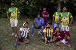 Players are seen before a match of “elle” in Naples, Italy on September 29, 2019. Every Sunday hundreds of people belonging to the Sri Lankan community in Italy gather in the “Real Bosco di Capodimonte” of Naples and play “elle”, a very popular Sri Lankan bat-and-ball game, often played in rural villages and urban areas.