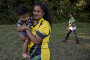 Players are seen before a match of “elle” in Naples, Italy on September 29, 2019. Every Sunday hundreds of people belonging to the Sri Lankan community in Italy gather in the “Real Bosco di Capodimonte” of Naples and play “elle”, a very popular Sri Lankan bat-and-ball game, often played in rural villages and urban areas.