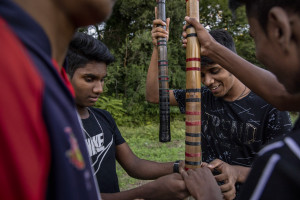 Players are seen before a match of “elle” in Naples, Italy on September 29, 2019. Every Sunday hundreds of people belonging to the Sri Lankan community in Italy gather in the “Real Bosco di Capodimonte” of Naples and play “elle”, a very popular Sri Lankan bat-and-ball game, often played in rural villages and urban areas.