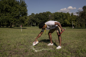 The referee traces the playing field with flour before a match of “elle” in Naples, Italy on September 29, 2019. Every Sunday hundreds of people belonging to the Sri Lankan community in Italy gather in the “Real Bosco di Capodimonte” of Naples and play “elle”, a very popular Sri Lankan bat-and-ball game, often played in rural villages and urban areas.