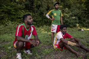 Players are seen before a match of “elle” in Naples, Italy on September 29, 2019. Every Sunday hundreds of people belonging to the Sri Lankan community in Italy gather in the “Real Bosco di Capodimonte” of Naples and play “elle”, a very popular Sri Lankan bat-and-ball game, often played in rural villages and urban areas.