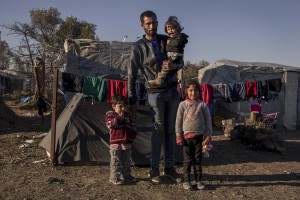 Hassan, 31 years old from Syria is portryed with his three sons Husam, Ola and Ghufran inside the Moria refugee camp where they have lived for three months on the island of Lesbos in Greece on February 18, 2020. About 20000 migrants and asylum seekers – mostly coming from Afghanistan and Syria – live in the official Moria camp and in the olive grove that is located nearby.