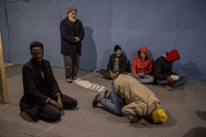 Men from Afghanistan, Syria and Somalia pray inside an informal mosque in the Moria refugee camp on the island of Lesbos in Greece on February 21, 2020. About 20000 migrants and asylum seekers – mostly coming from Afghanistan and Syria – live in the official Moria camp and in the olive grove that is located nearby.