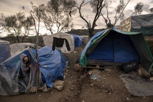 A child is seen inside the Moria refugee camp on the island of Lesbos in Greece on February 21, 2020. About 20000 migrants and asylum seekers – mostly coming from Afghanistan and Syria – live in the official Moria camp and in the olive grove that is located nearby.