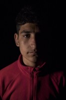 Arsh, 12 years old from Afghanistan is portrayed inside the Moria refugee camp on the island of Lesbos in Greece on February 20, 2020.
