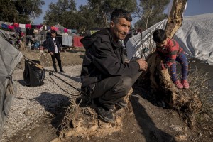 People are seen inside the Moria refugee camp on the island of Lesbos in Greece on February 18, 2020. About 20000 migrants and asylum seekers – mostly coming from Afghanistan and Syria – live in the official Moria camp and in the olive grove that is located nearby.