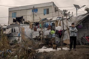 An Afghan man is seen inside the Moria refugee camp on the island of Lesbos in Greece on February 20, 2020. About 20000 migrants and asylum seekers – mostly coming from Afghanistan and Syria – live in the official Moria camp and in the olive grove that is located nearby.