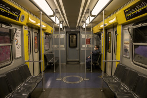 A man wearing a mask is seen inside a metropolitan train on the fifth day of unprecedented lockdown across of all Italy imposed to slow the spread of coronavirus in Naples, Southern Italy on March 14, 2020.
