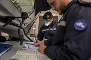 Local police officers are seen during security checks on the eighth day of unprecedented lockdown across of all Italy imposed to slow the spread of coronavirus in Naples, Southern Italy on March 17, 2020. Despite government bans, many people continue to go down the street, on foot or by car, for no important reason.
