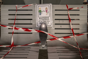 A sign indicating to maintain the distance of one meter between people is seen inside central station on the fifth day of unprecedented lockdown across of all Italy imposed to slow the spread of coronavirus in Naples, Southern Italy on March 14, 2020.