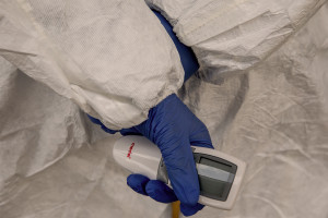 The thermometer used by medical officers to check the temperature of the people inside the port of the city on the second day of unprecedented lockdown across of all Italy imposed to slow the spread of coronavirus in Naples, Southern Italy on March 11, 2020.
