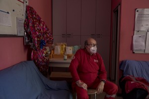 Angelo, ambulance driver is seen during a break inside the Italian Red Cross headquarters in Alzano Lombardo, Norther Italy on April 11, 2020.