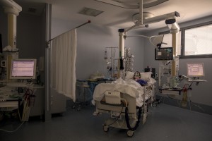 A patient lies in bed inside the coronavirus intensive care unit of the “Papa Giovanni XXIII” hospital in Bergamo, Northern Italy on April 17, 2020.