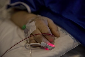 A patient lies in bed inside the coronavirus intensive care unit of the “Papa Giovanni XXIII” hospital in Bergamo, Northern Italy on April 17, 2020.