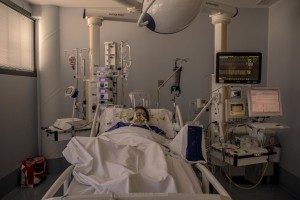 A patient lies in bed inside the coronavirus intensive care unit of the “Papa Giovanni XXIII” hospital in Bergamo, Northern Italy on April 17, 2020.