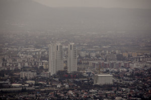 A general view of the city seen through polluted air in Skopje, North Macedonia on March 4, 2020. Skopje, located in the center of the Balkan peninsula, is nestled in a valley between mountain ranges that hem the city. The pollution problem is complicated by the inversion of temperature, a natural phenomenon that causes warm air to remain above cold air. This phenomenon creates a blanket of smog that settles heavily over the valley, trapping polluted air on city streets and in the lungs of residents. During the winter season the airport is sometimes closed due to the presence of toxic fog.