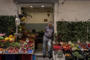 A greengrocer in the “Quartieri Spagnoli” in Naples, Italy on June 16, 2020. Popular neighborhoods are those that more than others are suffering from the economic crisis generated by the coronavirus. The rate of poverty and unemployment that was higher than the national average in Southern Italy even before the pandemic, increased following the lockdown imposed by the government to counter the spread of the coronavirus, which blocked the country’s economy for more than two months.