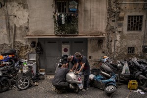 Mechanics at work in the “Quartieri Spagnoli” in Naples, Italy on June 16, 2020. Popular neighborhoods are those that more than others are suffering from the economic crisis generated by the coronavirus. The rate of poverty and unemployment that was higher than the national average in Southern Italy even before the pandemic, increased following the lockdown imposed by the government to counter the spread of the coronavirus, which blocked the country’s economy for more than two months.