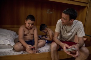 Gaetano Ippolito (right) 46 years old is seen with his sons Ciro (left) 7 years old and Diego (center) 5 years old in the house where they live in the “Rione Sanità” in Naples, Italy on June 17, 2020. Since the pandemic broke out, Gaetano has no longer been able to find any type of job, even on an occasional basis. Popular neighborhoods are those that more than others are suffering from the economic crisis generated by the coronavirus. The rate of poverty and unemployment that was higher than the national average in Southern Italy even before the pandemic, increased following the lockdown imposed by the government to counter the spread of the coronavirus, which blocked the country’s economy for more than two months.