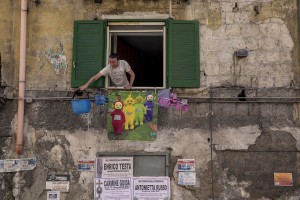 Gaetano Ippolito, 46 years old looking out the window of the house where he lives in the “Rione Sanità” in Naples, Italy on June 17, 2020. Since the pandemic broke out, Gaetano has no longer been able to find any type of job, even on an occasional basis. Popular neighborhoods are those that more than others are suffering from the economic crisis generated by the coronavirus. The rate of poverty and unemployment that was higher than the national average in Southern Italy even before the pandemic, increased following the lockdown imposed by the government to counter the spread of the coronavirus, which blocked the country’s economy for more than two months.