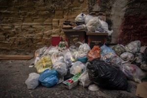 Garbage is seen in a street of the “Rione Sanità” in Naples, Italy on June 17, 2020. Popular neighborhoods are those that more than others are suffering from the economic crisis generated by the coronavirus. The rate of poverty and unemployment that was higher than the national average in Southern Italy even before the pandemic, increased following the lockdown imposed by the government to counter the spread of the coronavirus, which blocked the country’s economy for more than two months.