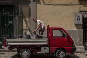 A man at work in the “Rione Sanità” in Naples, Italy on June 17, 2020. Popular neighborhoods are those that more than others are suffering from the economic crisis generated by the coronavirus. The rate of poverty and unemployment that was higher than the national average in Southern Italy even before the pandemic, increased following the lockdown imposed by the government to counter the spread of the coronavirus, which blocked the country’s economy for more than two months.