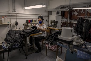 A woman at work inside the “GF” factory in Naples, Italy on June 30, 2020. The “GF” is an Italian factory that produces leather clothing and tailored suits. After the end of the lockdown and the consequent reopening of commercial activities, the “GF” factory saw its revenues drop by almost 50% and was forced to put some employees into layoffs.