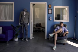 A man sits on a sofa of the “GF” factory in Naples, Italy on June 30, 2020. The “GF” is an Italian factory that produces leather clothing and tailored suits. After the end of the lockdown and the consequent reopening of commercial activities, the “GF” factory saw its revenues drop by almost 50% and was forced to put some employees into layoffs.