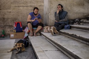 Homeless and their dogs are see inside the Umberto I gallery in Naples, Italy on June 15, 2020. During the lockdown imposed by the Italian government to contain the spread of coronavirus, homeless experienced a double emergency: the first one due to their condition, the second one linked to the closure of many assistance centers because of possible contagion.