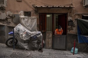 A women is seen inside a typical Neapolitan house called “basso” in the “Quartieri Spagnoli” in Naples, Italy on June 16, 2020.Popular neighborhoods are those that more than others are suffering from the economic crisis generated by the coronavirus. The rate of poverty and unemployment that was higher than the national average in Southern Italy even before the pandemic, increased following the lockdown imposed by the government to counter the spread of the coronavirus, which blocked the country’s economy for more than two months.