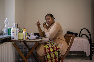 Yemisi Osula, 27 years old from Edo State, Nigeria is preparing for the Sunday mass in Asti, Northern Italy on January 12, 2020. Yemisi has been in Italy for more than two years and has been a guest of the Piam non-profit organization for about two months.