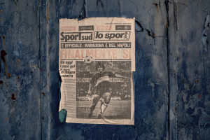 A newspaper dating back to the year 1984 which reports the purchase of the Argentine soccer legend Diego Armando Maradona by Napoli soccer, is attached outside the entrance of the former training center of Napoli football team in Naples, Southern Italy on November 24, 2021. Diego Armando Maradona died on November 25 of last year and next November 25, 2021 will be the anniversary of his death.