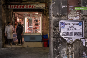 A funeral poster announcing the death of the Argentine soccer legend Diego Armando Maradona is seen on a wall in the historic center of Naples, Italy on November 28, 2020.