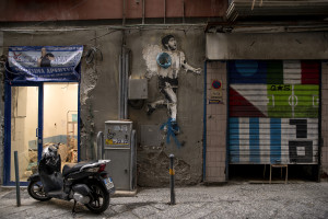 A mural depicting the Argentine soccer legend Diego Armando Maradona is seen in the Spanish Quarter in Naples, Southern Italy on November 24, 2021. Diego Armando Maradona died on November 25 of last year and next November 25, 2021 will be the anniversary of his death.