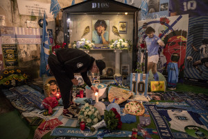 NAPLES, ITALY – NOVEMBER 25: A man is seen during a commemoration organized on the occasion of the anniversary death of the Argentinian soccer legend Diego Armando Maradona at Spanish quarter, in Naples, Southern Italy on November 25, 2021.