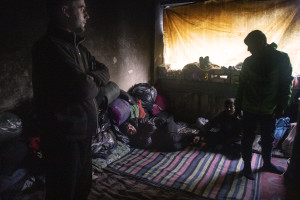 Migrants are seen inside an abandoned factory in Bihac, Bosnia and Herzegovina on January 22, 2021. Lots of migrants avoid staying inside the Bosnian official refugee camps because of the hard conditions in which they are forced to live and also because the people hosted in the official camps  cannot go out freely.