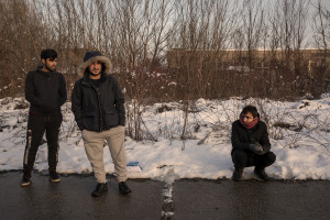 Migrants are seen outside an abandoned factory in Bihac, Bosnia and Herzegovina on January 26, 2021. Lots of migrants avoid staying inside the Bosnian official refugee camps because of the hard conditions in which they are forced to live and also because the people hosted in the official camps  cannot go out freely.