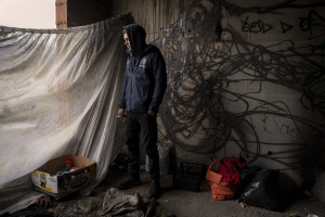 Milad, 28 years old from Iran is portrayed inside an abandoned bulding in Bihac, Bosnia and Herzegovina on January 21, 2021. After leaving his country due to political problems, he lived in Serbia for a year. He has been in Bosnia for a week. Lots of migrants avoid staying inside the Bosnian official refugee camps because of the hard conditions in which they are forced to live and also because the people hosted in the official camps  cannot go out freely.