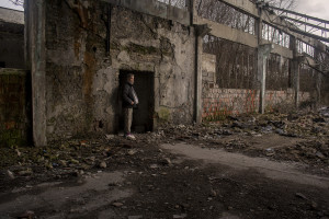 A Pakistani migrant is seen inside an abandoned factory in Bihac, Bosnia and Herzegovina on January 22, 2021. Lots of migrants avoid staying inside the Bosnian official refugee camps because of the hard conditions in which they are forced to live and also because the people hosted in the official camps  cannot go out freely.