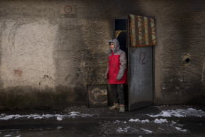 A migrant is seen outside an abandoned factory in Bihac, Bosnia and Herzegovina on January 26, 2021. Lots of migrants avoid staying inside the Bosnian official refugee camps because of the hard conditions in which they are forced to live and also because the people hosted in the official camps  cannot go out freely.