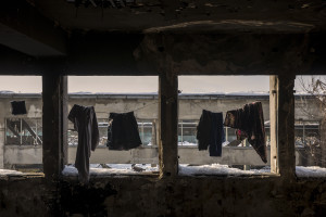 Clothes hanging out to dry inside an abandoned factory in Bihac, Bosnia and Herzegovina on January 26, 2021. Lots of migrants avoid staying inside the Bosnian official refugee camps because of the hard conditions in which they are forced to live and also because the people hosted in the official camps  cannot go out freely.