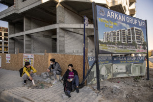 Shukrullah, 15 years old (left), Yons, 13 years old (center) and Nematullah, 16 years old (right) from Ghazni province, Afghanistan are seen in a street of Tatvan, Turkey on October 22, 2021. They have paid 1300 dollars each for their journey from Afghanistan to Turkey.