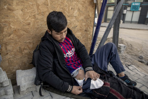 Nematullah, 16 years old from Ghazni province, Afghanistan just out of the hospital shows an injury he got as he walked the road from Van to Tatvan and tried to escape from the Turkish police in Tatvan, Turkey on October 22, 2021. After injuring himself, some people accompanied him to the Bitlis hospital where he underwent surgery and kept under observation for sixteen days.