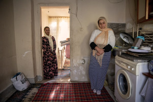 Farida, 31 years old from Afghanistan (right) and Wida, 22 years old from Afghanistan (left) are seen inside the house where they have lived since they arrived in Van, Turkey on October 21, 2021.