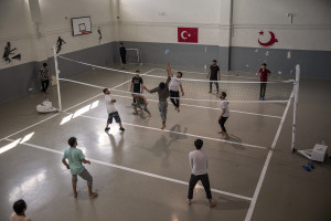 Refugees from Afghanistan play volley inside the Kurubas detention center in the border city of Van, Turkey on October 25, 2021. The center opened in April 2017 and hosts mostly Afghans arrested while trying to illegally enter Turkey via Iran. According to Cuma Omurca, director of the migration department in Van province, the goal is to stop irregular immigration and the activity of smugglers.