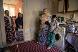 From left: Wida, 22 years old, Tayiba, 17 years old, Farida, 31 years old and Rashad, 9 years old from Afghanistan are seen inside the house where they have lived since they arrived in Van, Turkey on October 21, 2021.