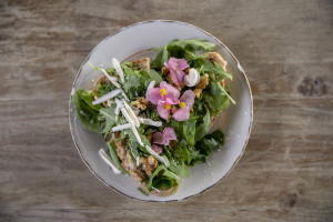 A plate of bruschetta with Mediterranean flavors with cheese, ricotta and walnuts prepared by chef Giovanna Voria, 63 years old inside the kitchen of the Corbella farmhouse in Cicerale, Southern Italy on October 3, 2021. Giovanna Voria is an ambassador of the Mediterranean diet in the world, which according to many studies is the basis of longevity. This type of diet involves the consumption of almost exclusively plant foods that are rich in antioxidant biomolecules and protect against the onset of many chronic diseases.