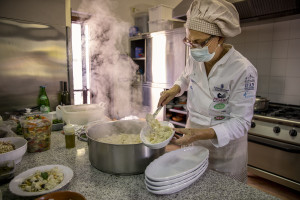 Chef Giovanna Voria, 63 years old at work inside the kitchen of the Corbella farmhouse in Cicerale, Southern Italy on October 3, 2021. Giovanna Voria is an ambassador of the Mediterranean diet in the world, which according to many studies is the basis of longevity. This type of diet involves the consumption of almost exclusively plant foods that are rich in antioxidant biomolecules and protect against the onset of many chronic diseases.