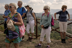 Swedish tourists are seen during a guided tour in Cuccaro Vetere, Southern Italy on October 1, 2021. Cuccaro Vetere is a small village of just over five hundred inhabitants in the Salerno area considered “blue zone”, that is one of those places where people live longer than the average.